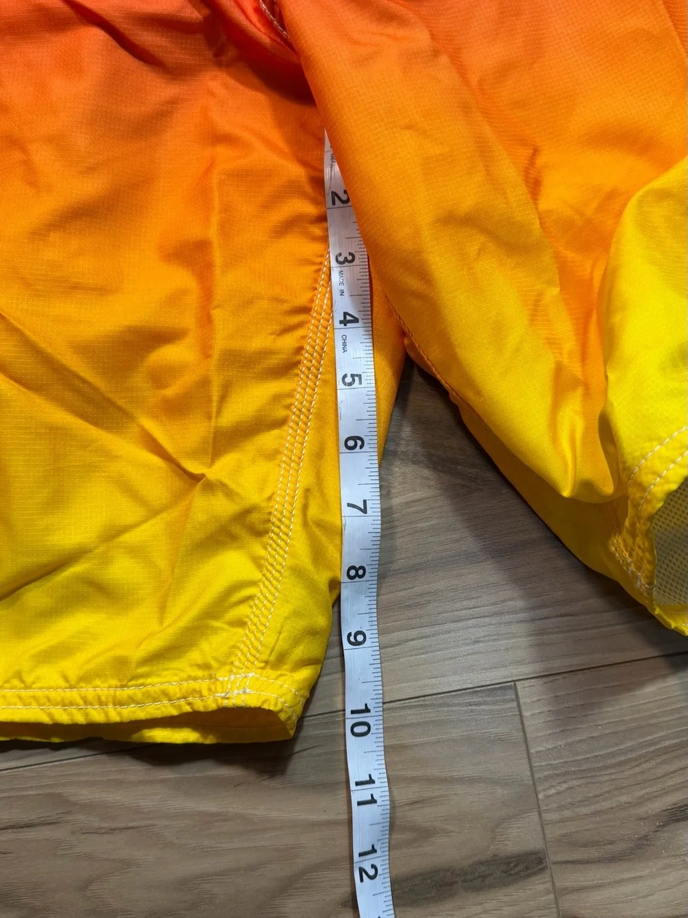 Brand new with tags Rusty Men’s Gradient Red-Orange-Yellow Swim Trunks